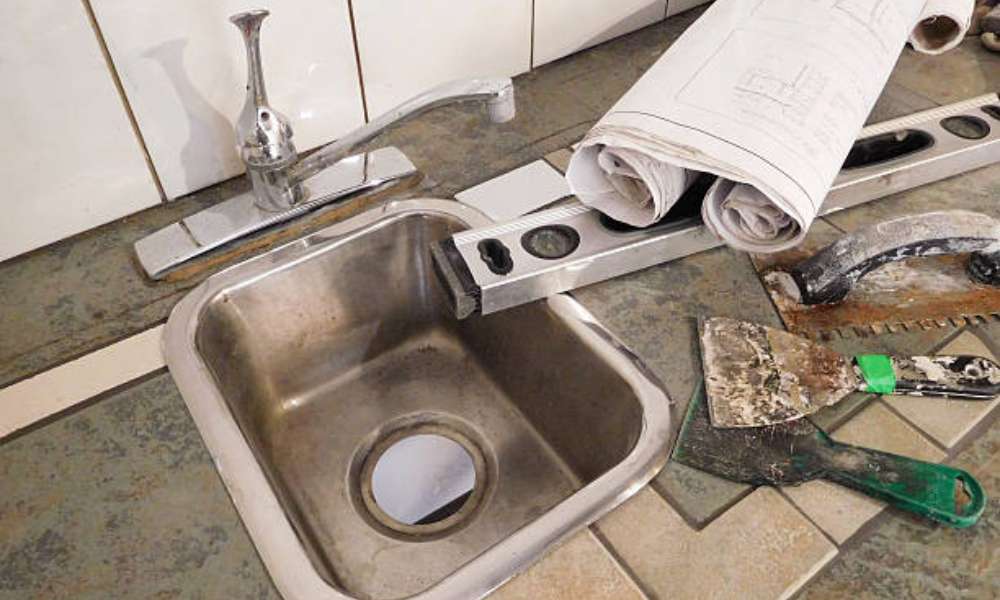how to remove an undermount sink